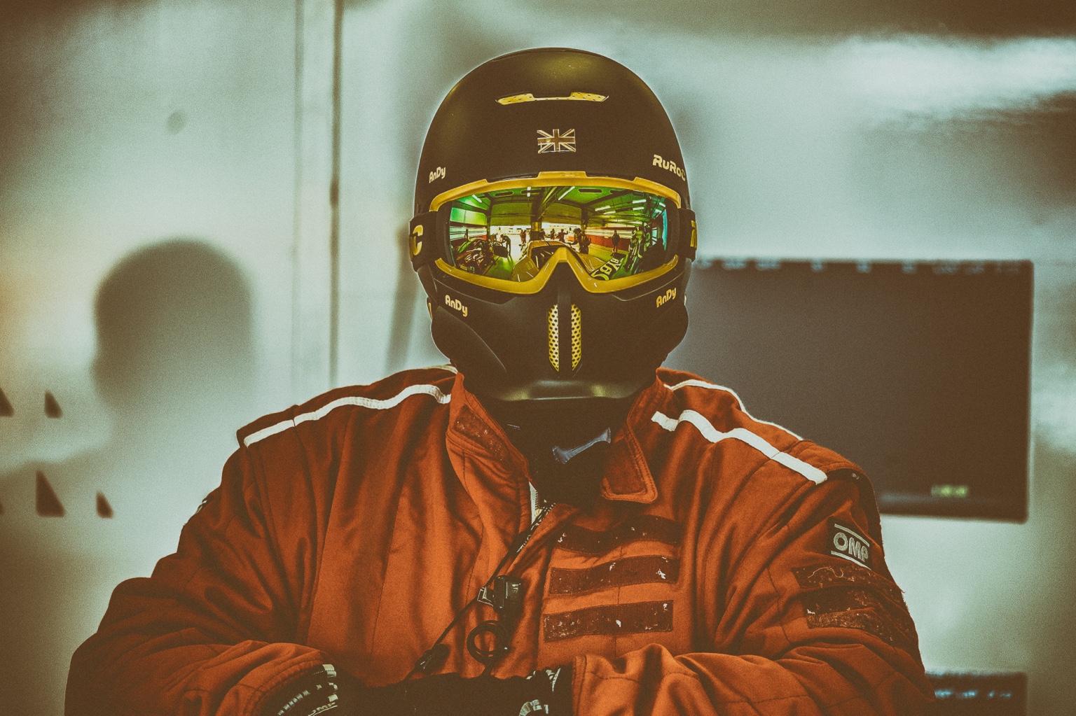 Race car moving through a live motorsport environment
